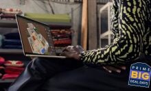 fashionable young person typing on m3 macbook air; badge over image reads 'Prime Big Deal Days'