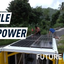 A mobile nanogrid with solar panels on the rooftop has stopped on a road near a forest. Caption reads" 'Mobile sun power."