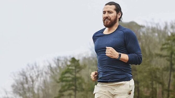 Man running with a fitbit on his wrist