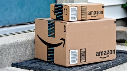 Two amazon prime cardboard boxes at doorstep
