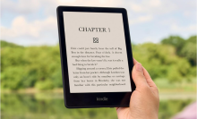 person holding kindle paperwhite