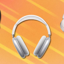 Headphones on orange and white abstract background