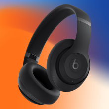 Beats Studio Pro on an orange, white and blue watercolor background