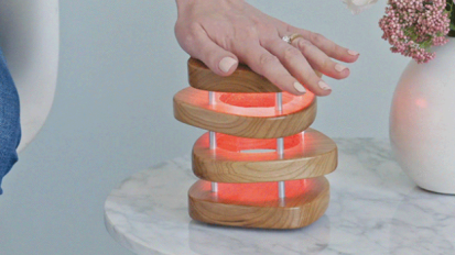Wooden stack lamp glowing orange